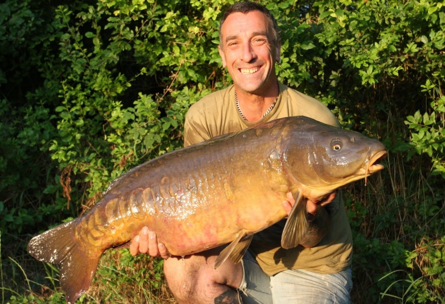 Russ with "the survivor" 41.12lb, the tree line July 2013