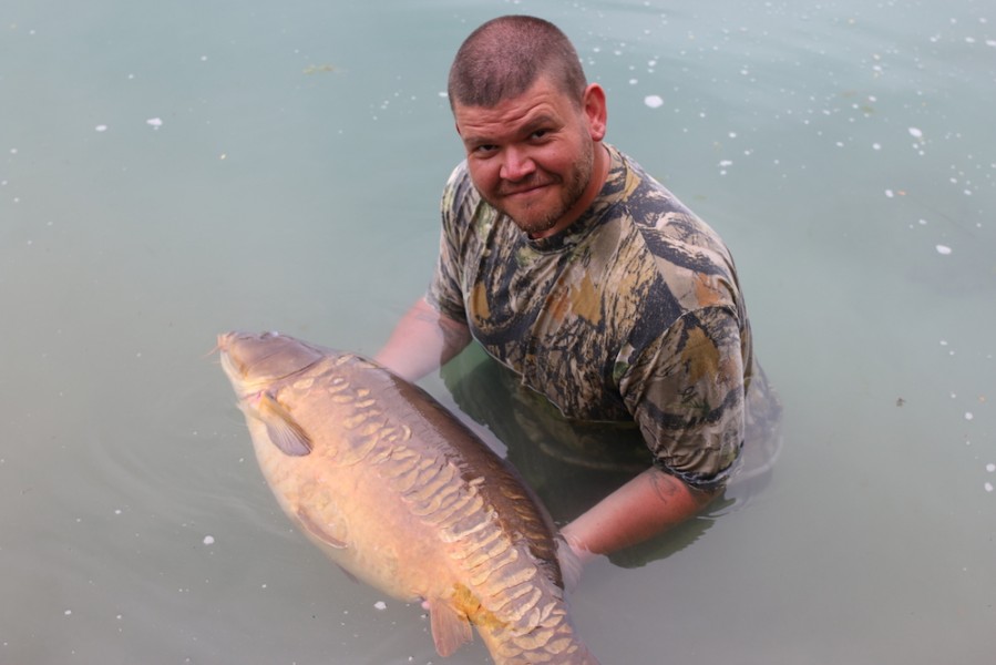 Dan Stroud cradles Scale Perfect before releasing her back to the depths of Gigantica