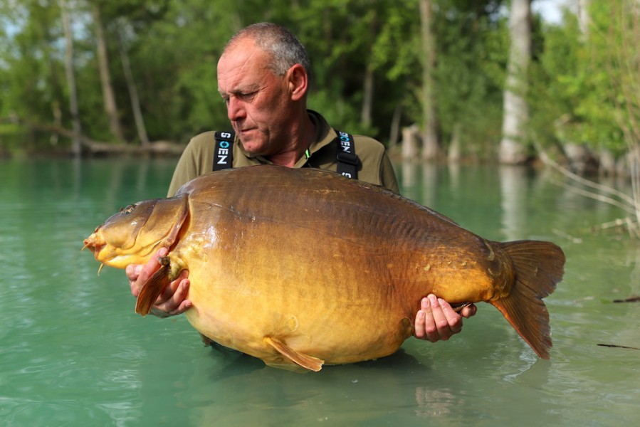 Holding a sixty pound carp isn't the easiest of things.