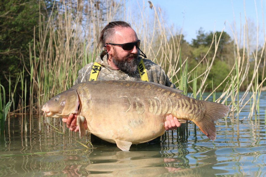 Chris with Mr Chow at 54lb 10oz