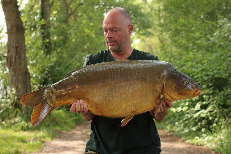 Glenn with The Exclusive and a new 40lb for the Main lake