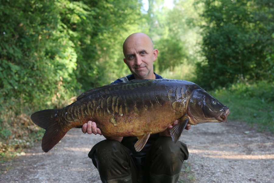 Chris with an original scaley Ryan's Run 31lb 15oz