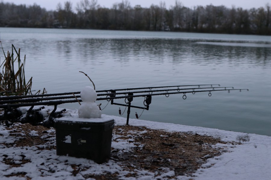 Snow Man Fishing