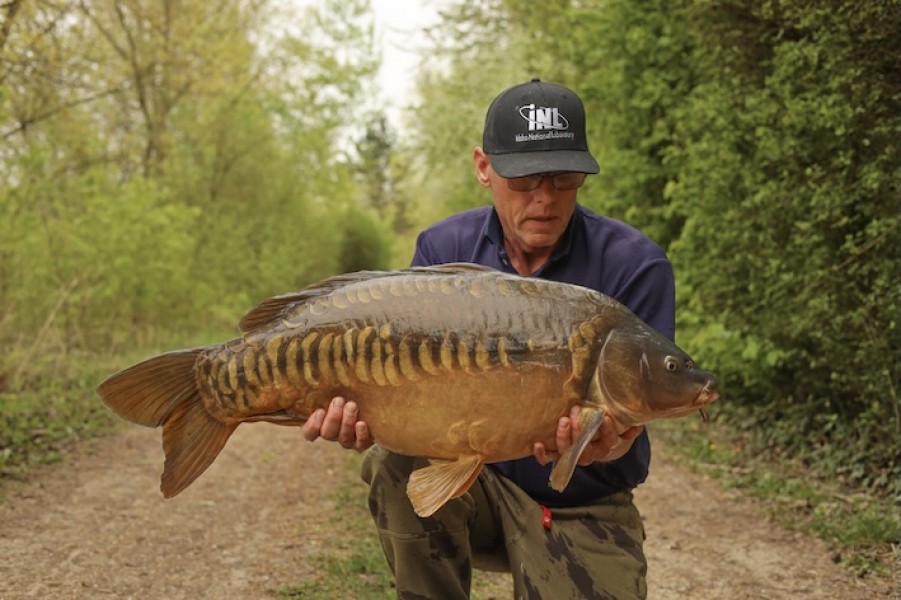 Solid Scales for John fishing in Tree Line, 29lb 12oz